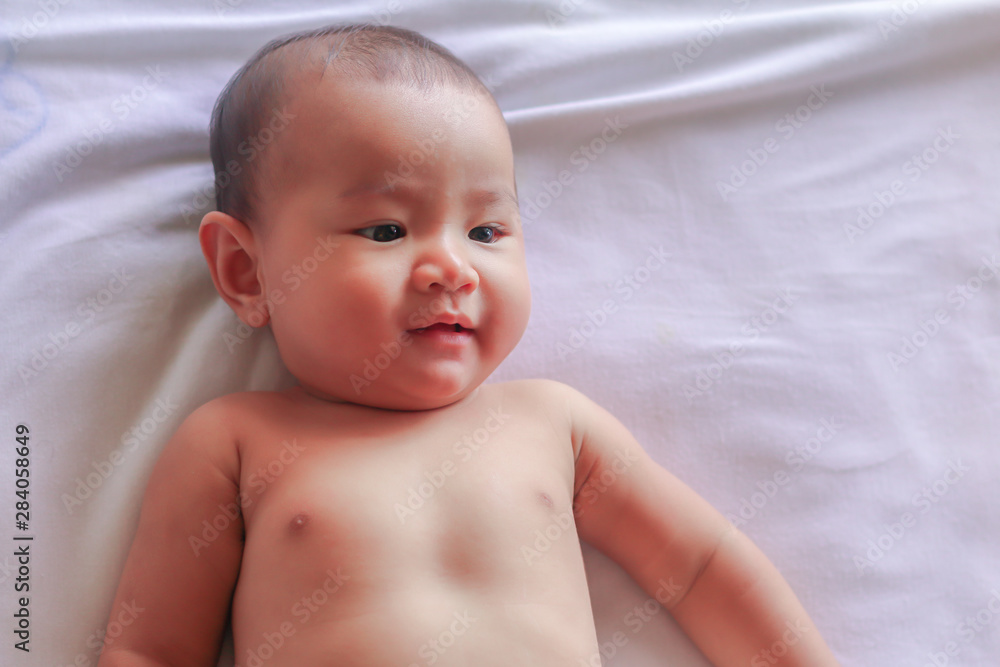 asian baby girl in bed room asian baby girl in bed room