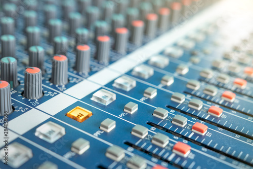 Professional audio mixing console. Mixer control and check.