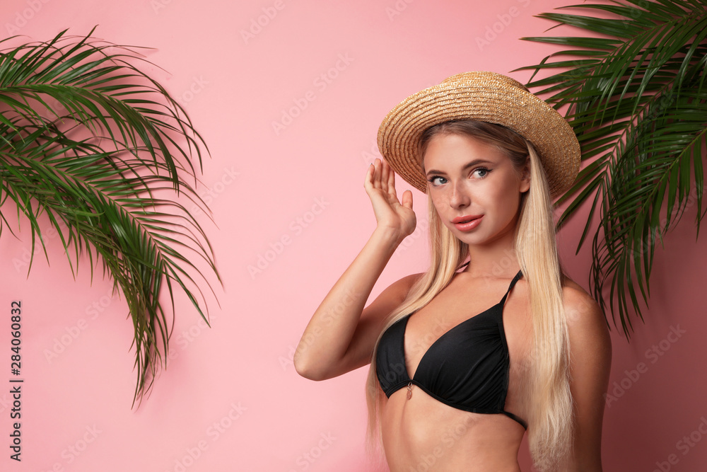Pretty young woman wearing stylish bikini on pink background Pretty young woman wearing stylish bikini on pink background