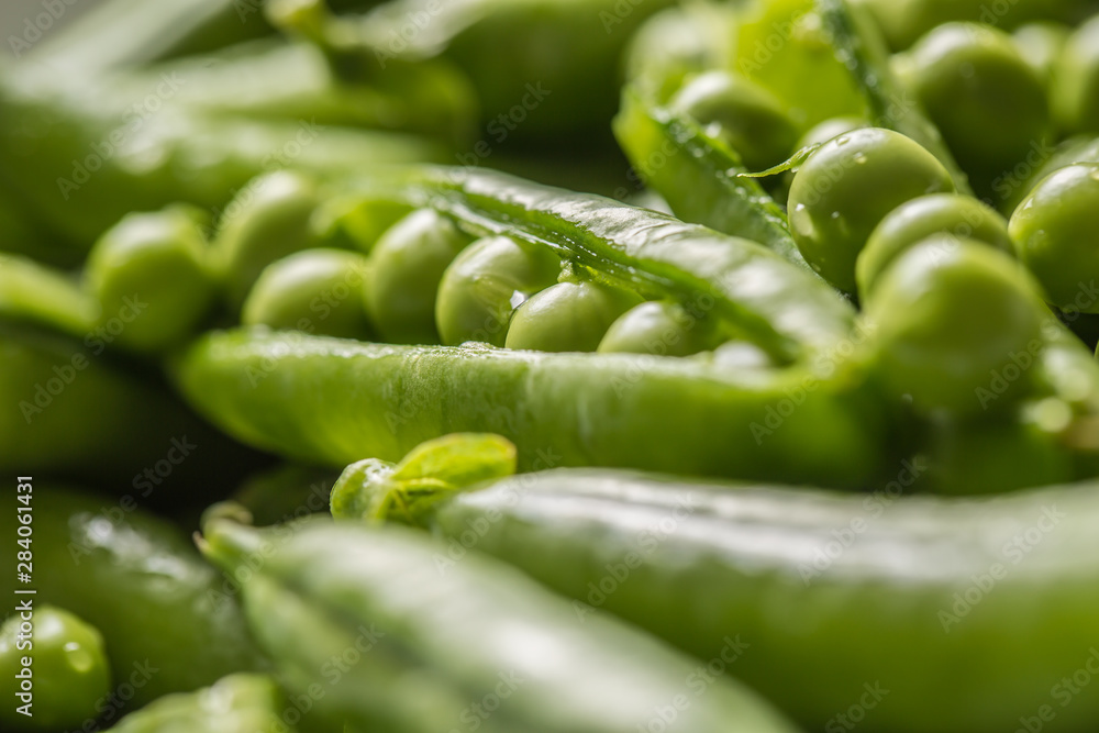 Fresh green pea seeds and pods - Close up Fresh green pea seeds and pods - Close up