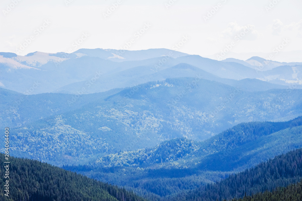 Great views of the blue mountains, which are distant and lose their color saturation_ Great views of the blue mountains, which are distant and lose their color saturation_