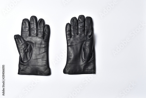 Mens black gloves on a white background