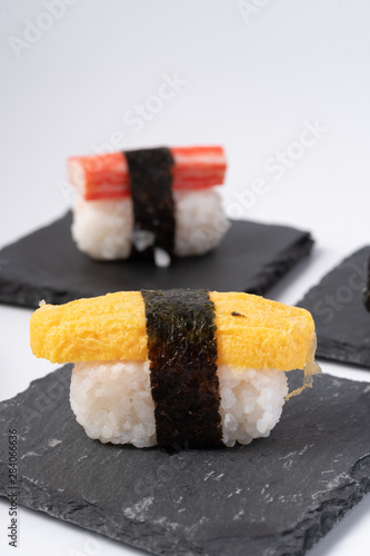 Mix sushi set, Japanese food on slate platte isolated white background