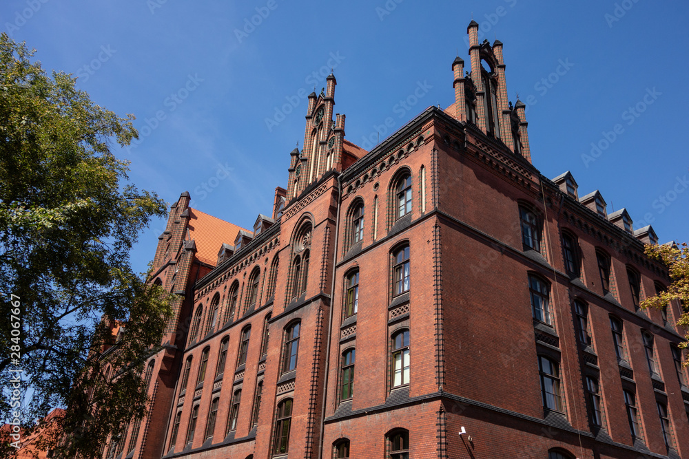 Red brick historic building of Metropolitan Seminary (Metropolitalne Wyższe Seminarium Duchowne) in Wroclaw