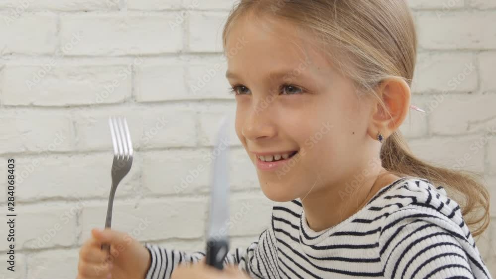 Child Eating Breakfast in Kitchen, Kid Eats Healthy Food Eggs, Girl Vegetables Child Eating Breakfast in Kitchen, Kid Eats Healthy Food Eggs, Girl Vegetables
