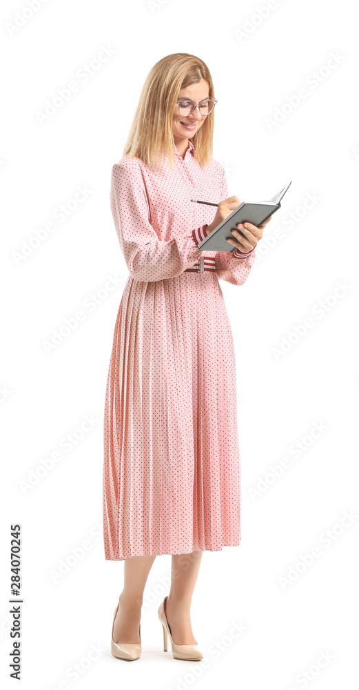 Beautiful female teacher with book on white background Beautiful female teacher with book on white background