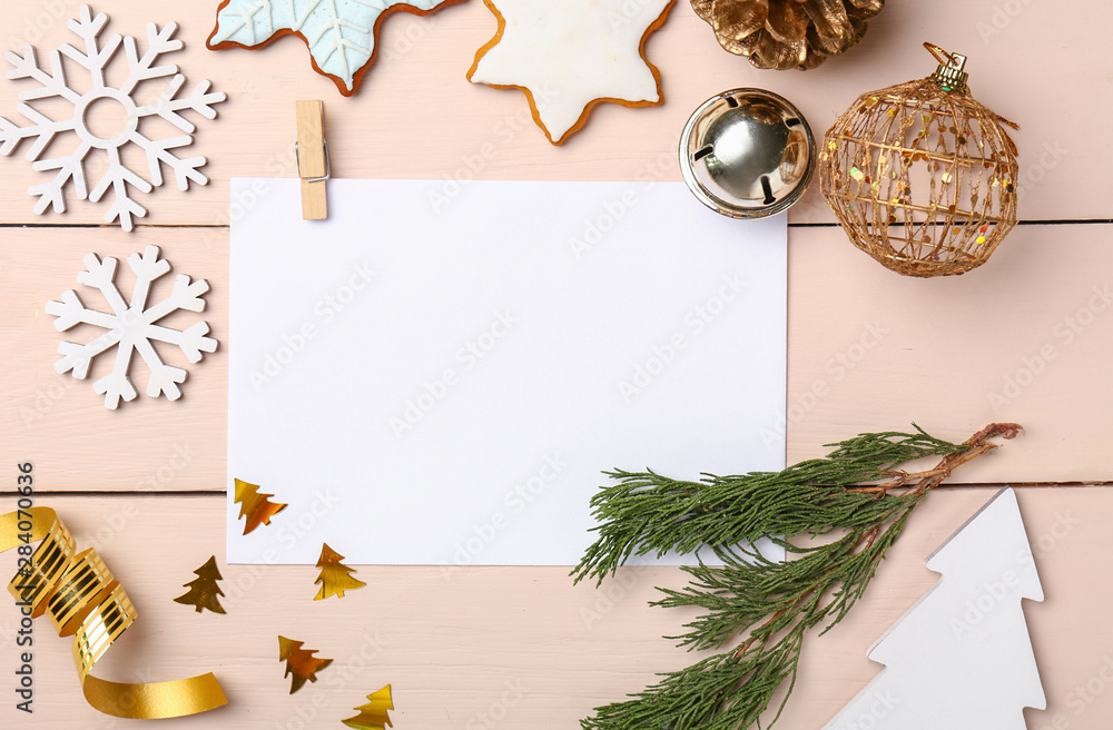 Empty greeting card with Christmas decor on white wooden background Empty greeting card with Christmas decor on white wooden background