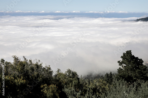 Beautiful white clouds above mountains