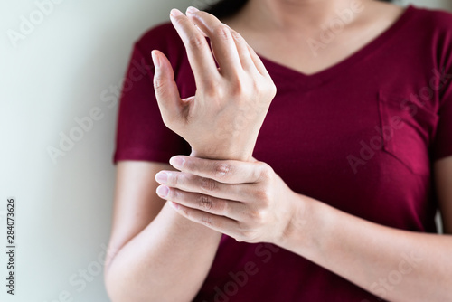 woman wrist arm pain long working. office syndrome healthcare and medicine concept photo