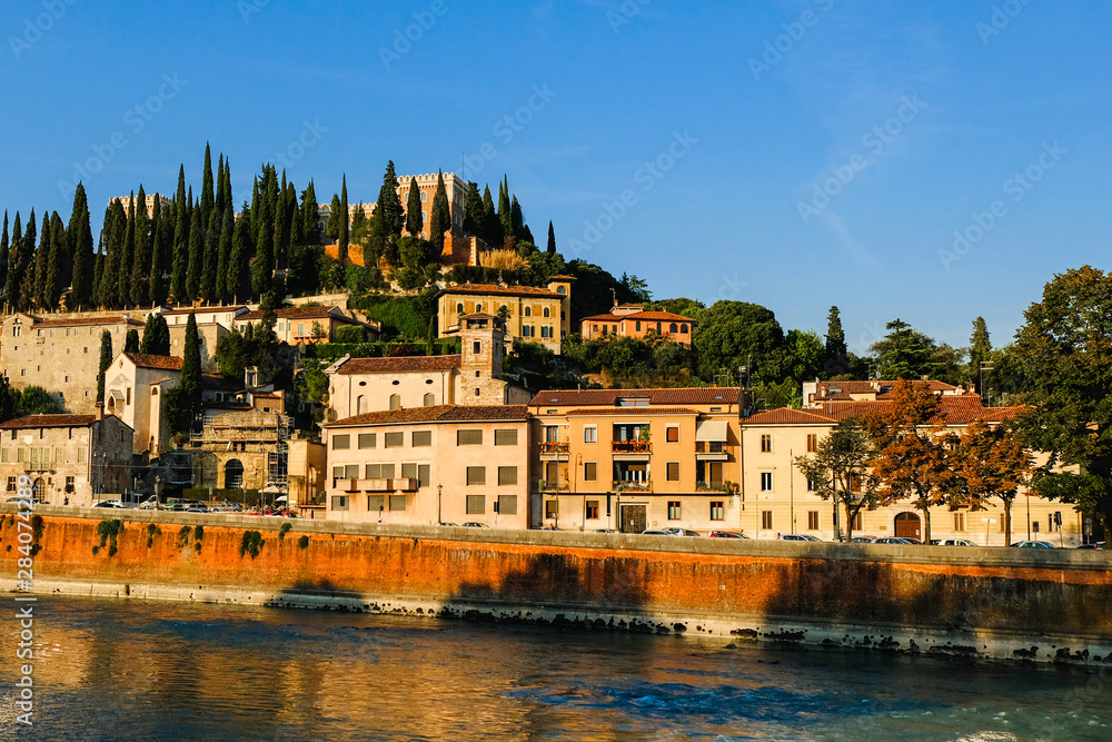 Verona, Italy: View of the embankment of Adige river and Castle San Pietro.