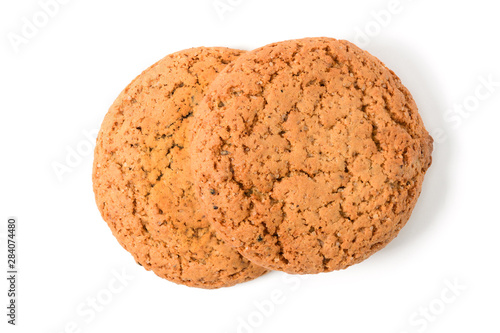 Homemade cookies. Two sweet cookie made from oatmeal flour. Tasty biscuit in high resolution closeup isolated on white background  top. Homemade bakery.