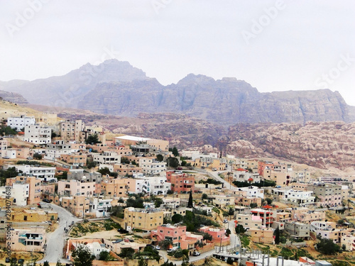 Panoramic view in Petra in Jordan, city central and UNESCO World Heritage Site, a historical archaeological park with caves, temples, and tombs reveal human civilization and Nabataean caravan-city. © isparklinglife