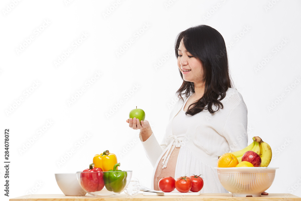Belly women prepare food on the table. Belly women prepare food on the table.