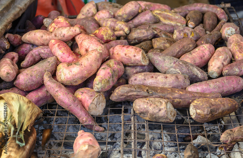 Sweet potato roasted on roaster in walking street market.