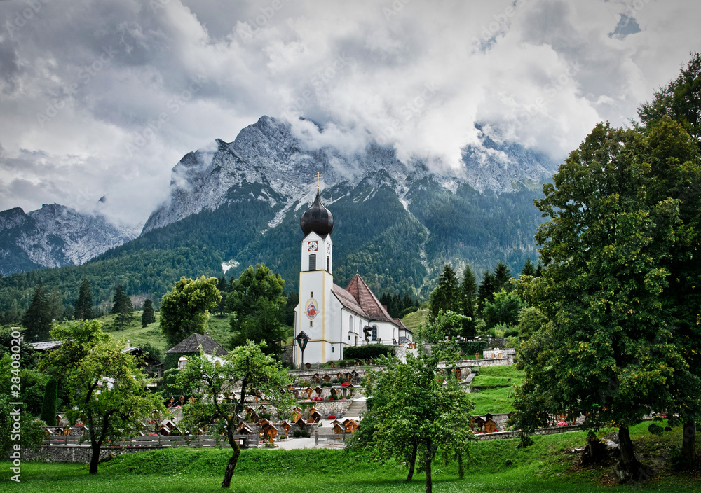 Church by the Alps in Grainau Bavaria Germany View of Grainau's church with the Zugspitze behind