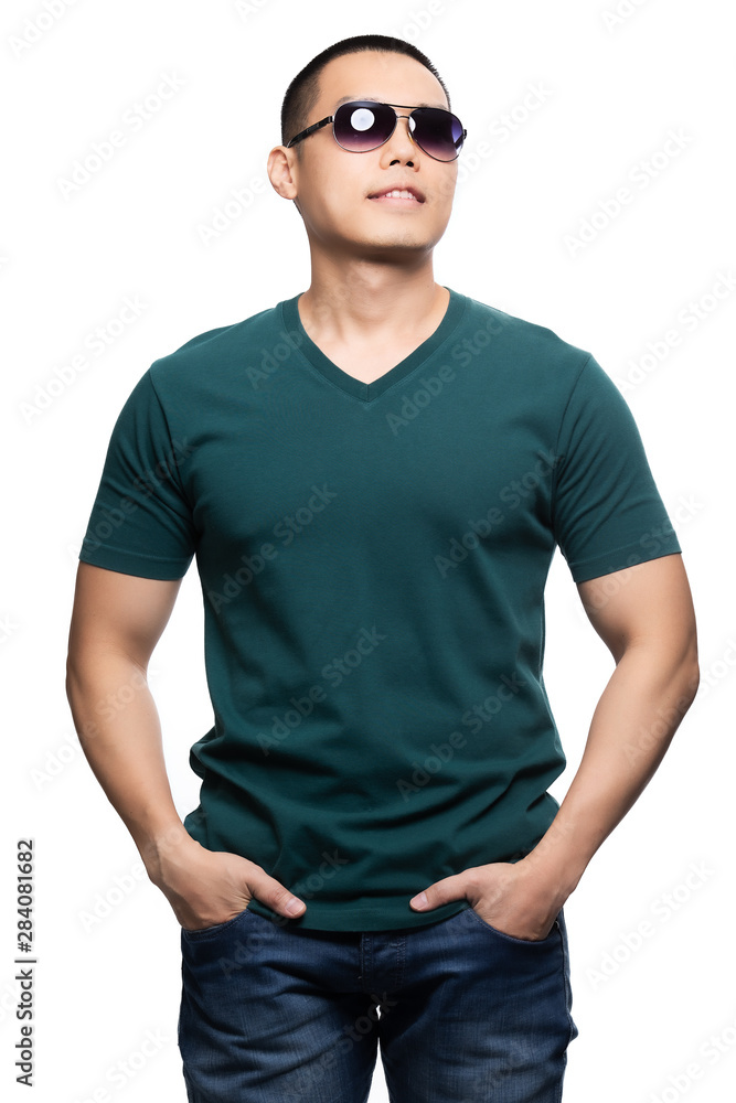 Fototapeta premium Asian model for green v-neck tshirt blank mockup template in your clothing design.