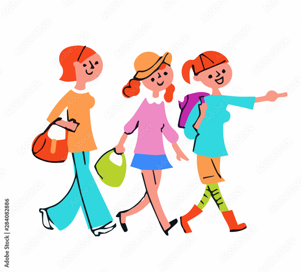 Three young women walking with a smile