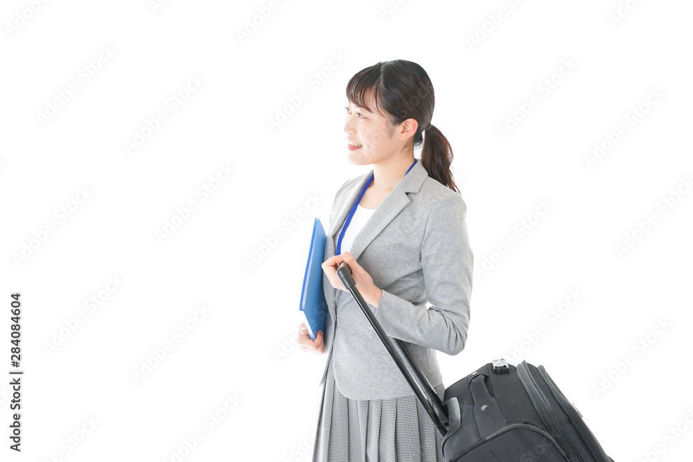 出張に行く若いビジネスウーマン 出張に行く若いビジネスウーマン