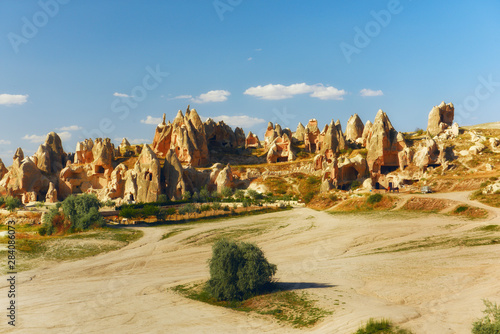 The rocky terrain of Turkey. Cappadocia Hot sunny landscape. Cave rock cities.