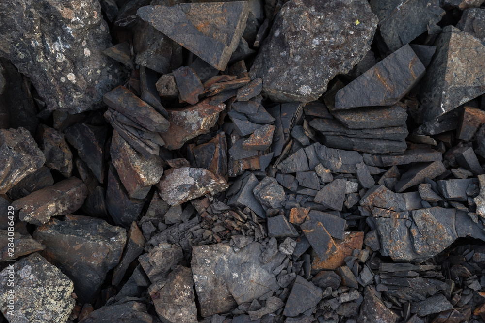 Black and grey hard edges stones different sizes Black and grey hard edges stones different sizes