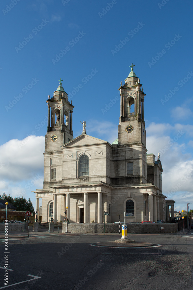 Fototapeta premium The Parish Church of Ss. Peter and Paul in Athlone town in the county of Westmeath, Ireland. Vertical photograph taken on sunny day in Athlone, located in central Ireland.