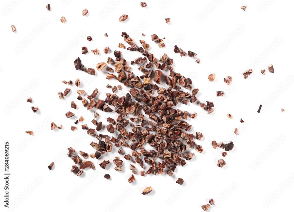 Chopped cocoa pile isolated on white background, top view