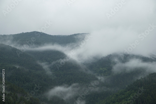 Mountains between mists.