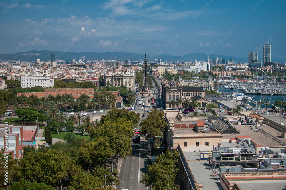 BARCELONA, SPAIN - SEPTEMBER 9, 2014: Cityscape of Barcelona, with a view of Columbus monument. Barcelona is the 2nd largest city in Spain and a hugely popular tourist destination