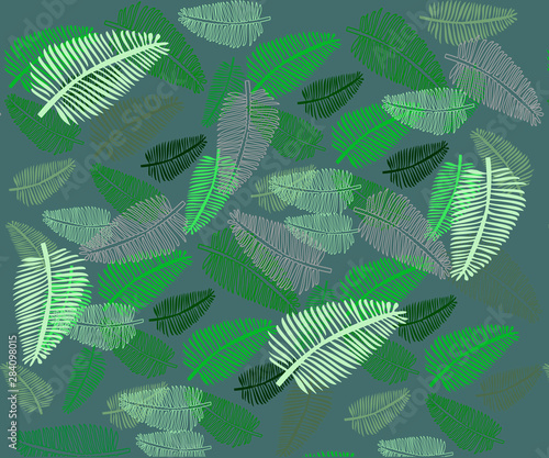 Seamless vector pattern of tropical green leaves on a green background. Beaut...