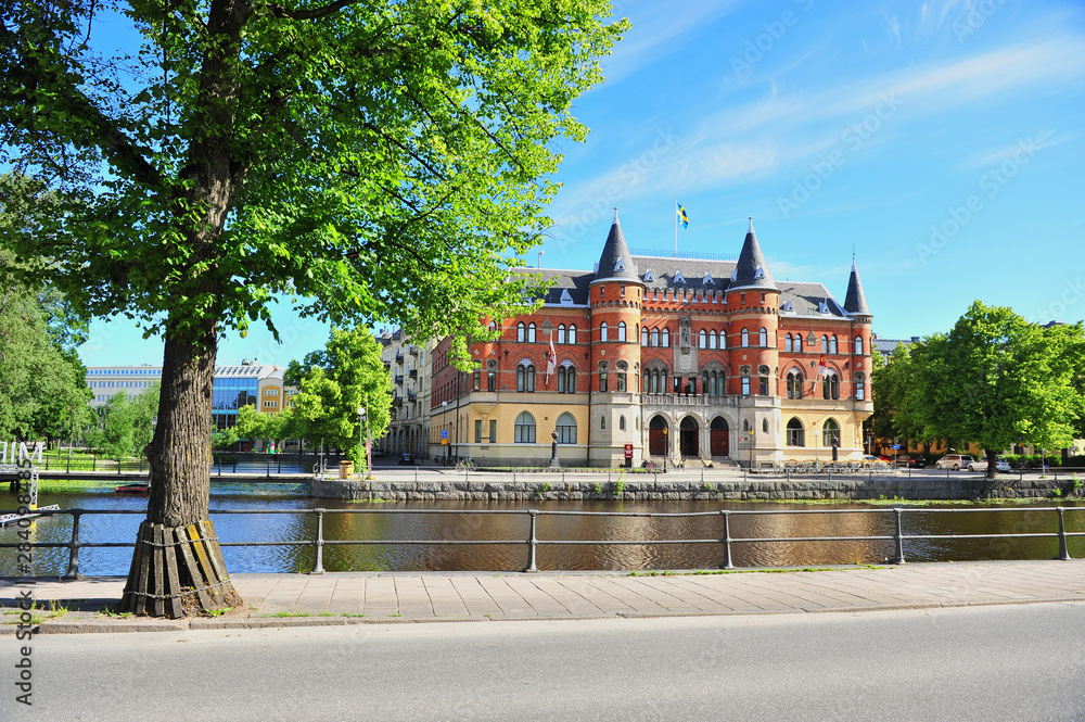 Ταπετσαρία View of historical building by the river in city centre of Orebro