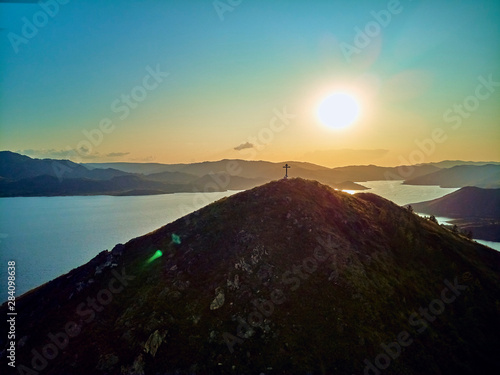 Beautiful panoramic aerial summer view at sunset to the Bukhtarma artificial reservoir, formed by the dam of the Bukhtarma hydroelectric station on the Irtysh river, Kazakhstan (Qazaqstan) photo