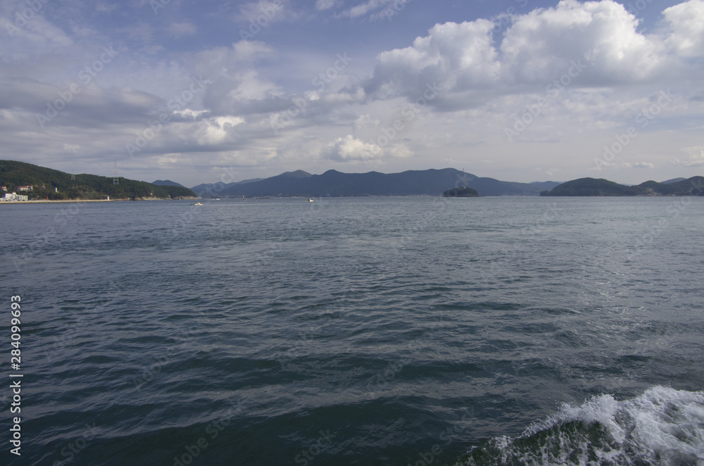 blue sea and islands on blue sky blue sea and islands on blue sky