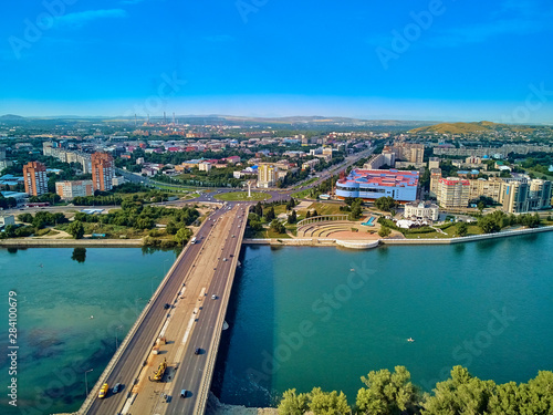 UST-KAMENOGORSK, KAZAKHSTAN (QAZAQSTAN) - August 08, 2019: Beautiful panoramic aerial drone view to Baiterek (Bayterek) Tower - symbol Kazakh's people freedom - in Oskemen