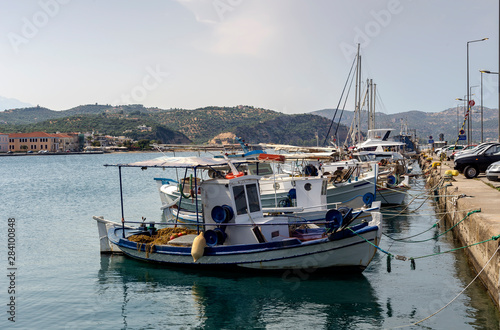 Moored fishing ships on the waterfront close-up (Greece, Peloponnese)