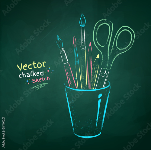 Vector chalk illustration of art tools in holder