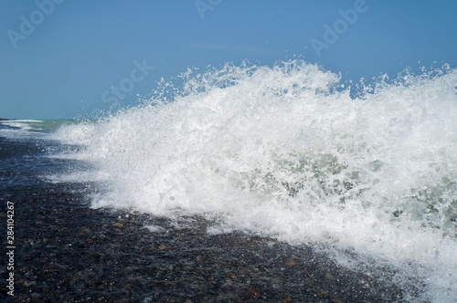 Foamy wave breaking on the shore!