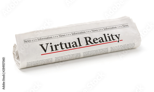 Rolled newspaper with the headline Virtual Reality