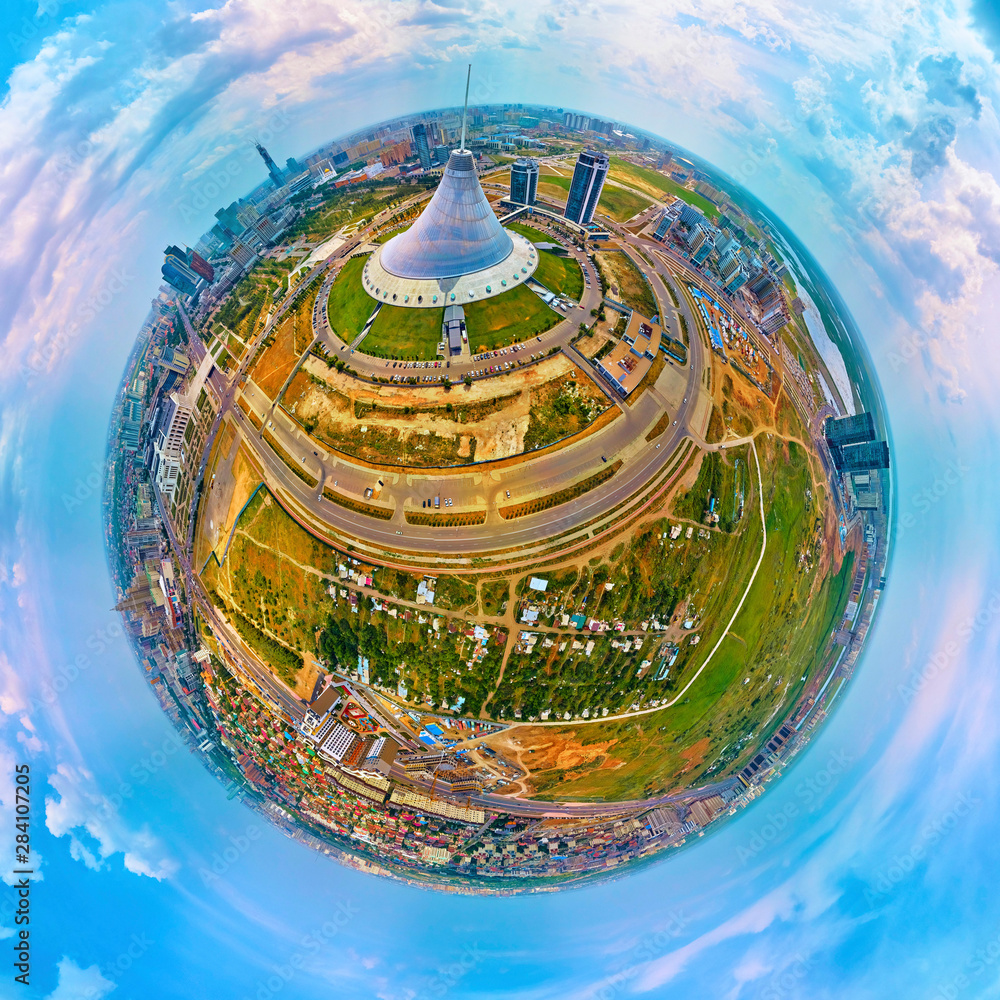 NUR-SULTAN, KAZAKHSTAN - July 29, 2019: Beautiful panoramic (360 spherical panorama little planet) aerial drone view to Nursultan (Astana) city center with skyscrapers and Khan Shatyr Entertainment Ce