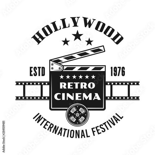 Cinema vector vintage emblem with clapperboard