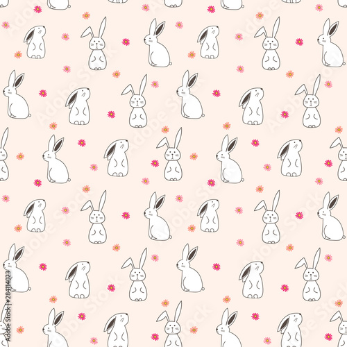 Cute bunny seamless pattern background. Vector illustration for fabric and gift wrap design.