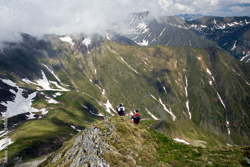 Mountaineers hiking in the Southern Carpathian Mountains photo