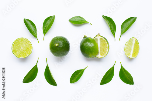 Wallpaper Mural Fresh limes with leaves isolated on white Torontodigital.ca
