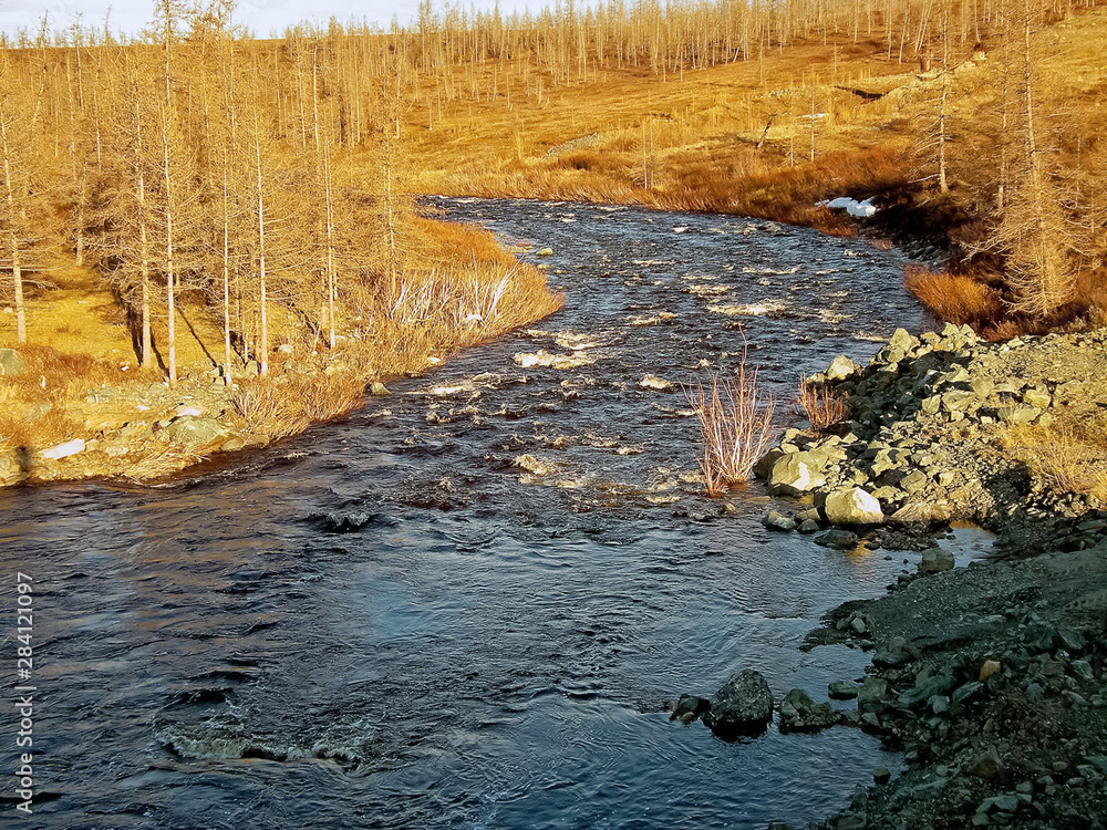 River landscape Early spring. bare trees, melting snow. River landscape Early spring. bare trees, melting snow.