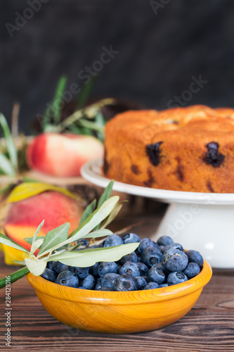 Homemade fruit cake with peaches and blueberries.