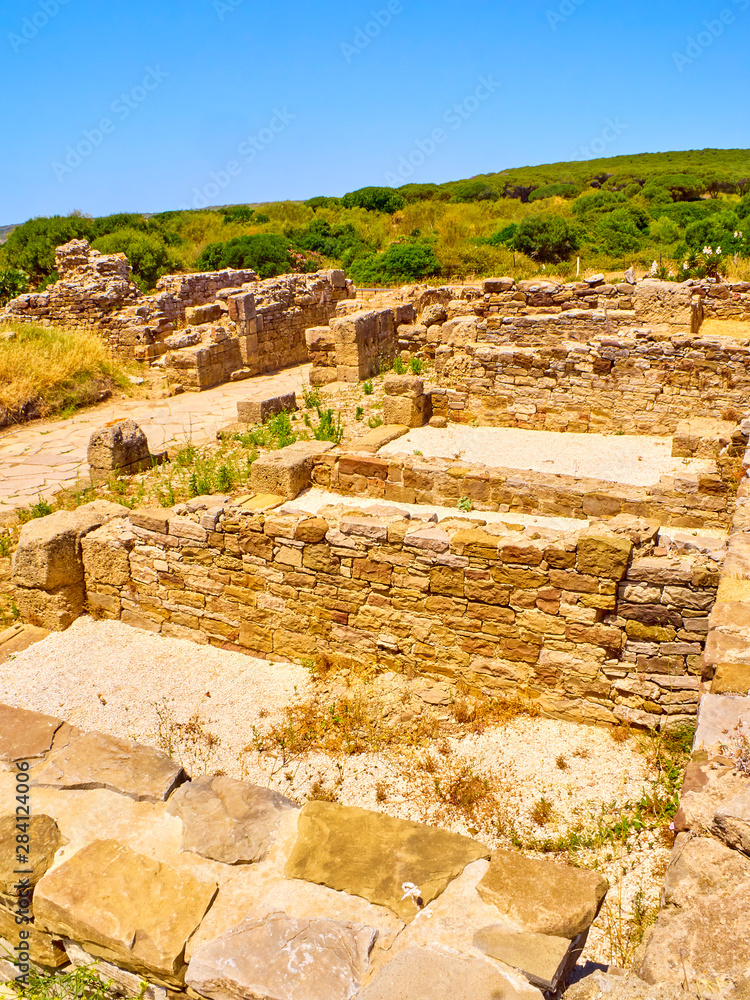 Remains of the Domus and Tabernae of Decumanus Maximus street. Baelo Claudia Archaeological Site. Tarifa, Cadiz. Andalusia, Spain.