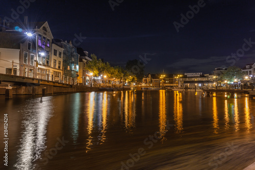 Dutch city center with blurred reflections in water