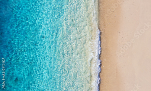 Beach and ocean as a background from top view. Azure water background from top view. Summer seascape from air. Travel - image