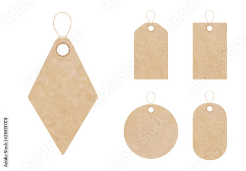 Set of blank gift tag labels for sale prices. Texture of realistic brown yellow kraft carton paper material with a rope. Stickers of different round, square, rectangular and rhomboid shapes