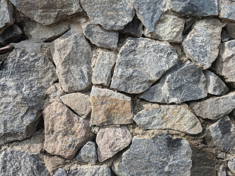 Texture of a stone wall background Texture of a stone wall background
