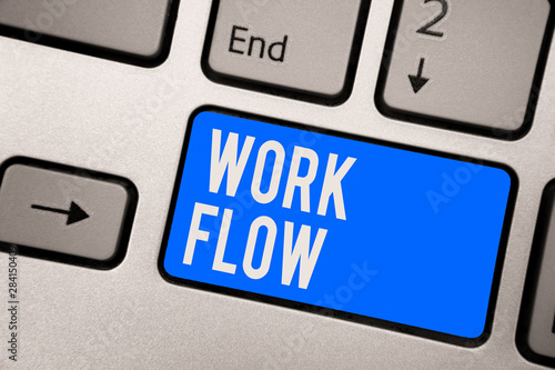 Text sign showing Work Flow. Conceptual photo Continuity of a certain task to and from an office or employer Keyboard blue key Intention create computer computing reflection document photo